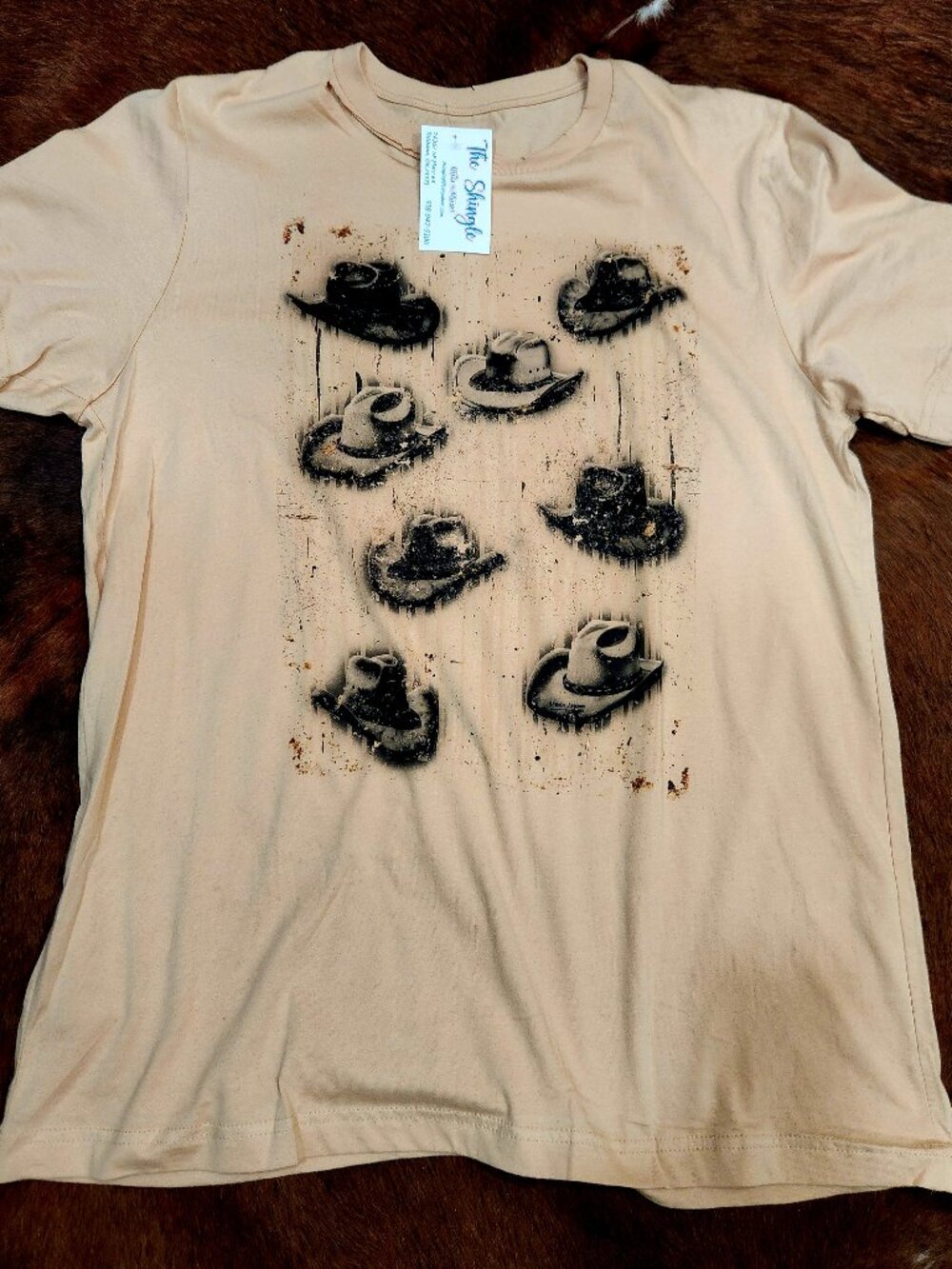 Relism Arrows tee shirt black cowboy hat print on the front